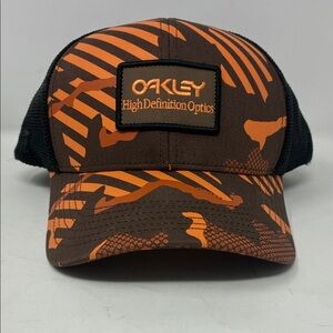 Oakley B1B HDO PATCH TRUCKER - ORANGE STRIPE/GRIP CAMO